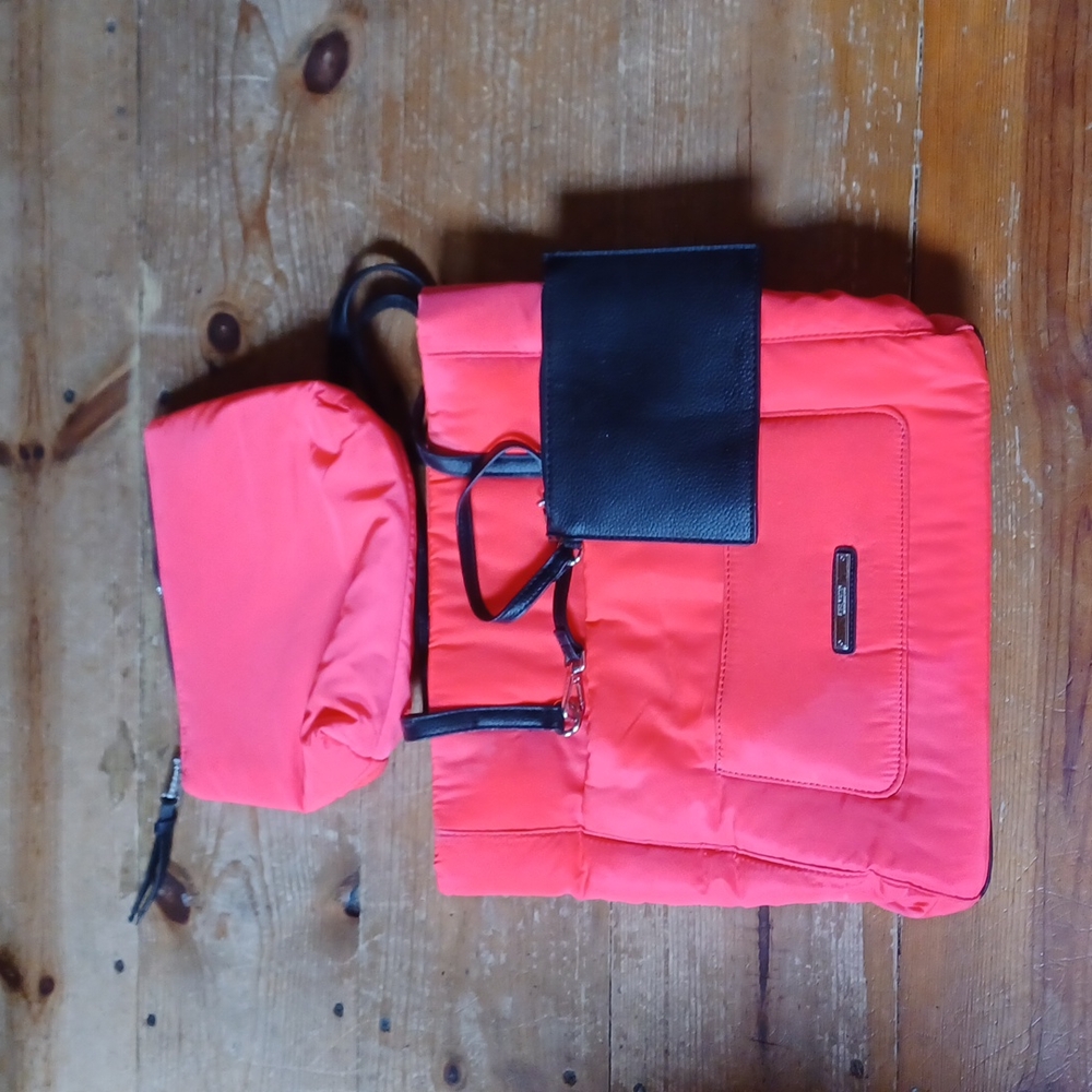 Steve Madden Bag. Comes with two smaller bags. Medium size. Hot pink and black.